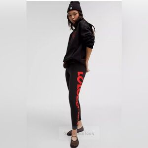 Black and Red Logo Lululemon Leggings, size 6